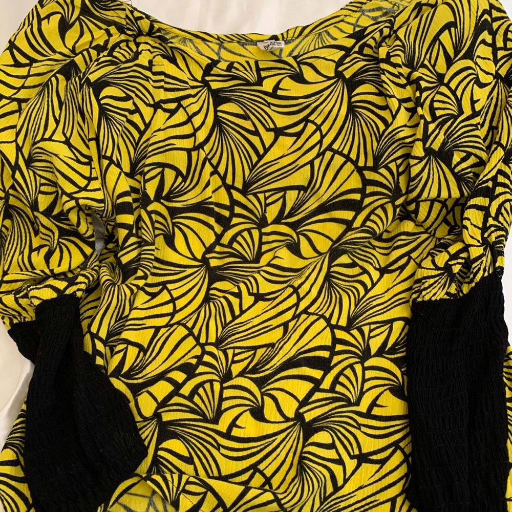 Boho chic long sleeve yellow and black top.